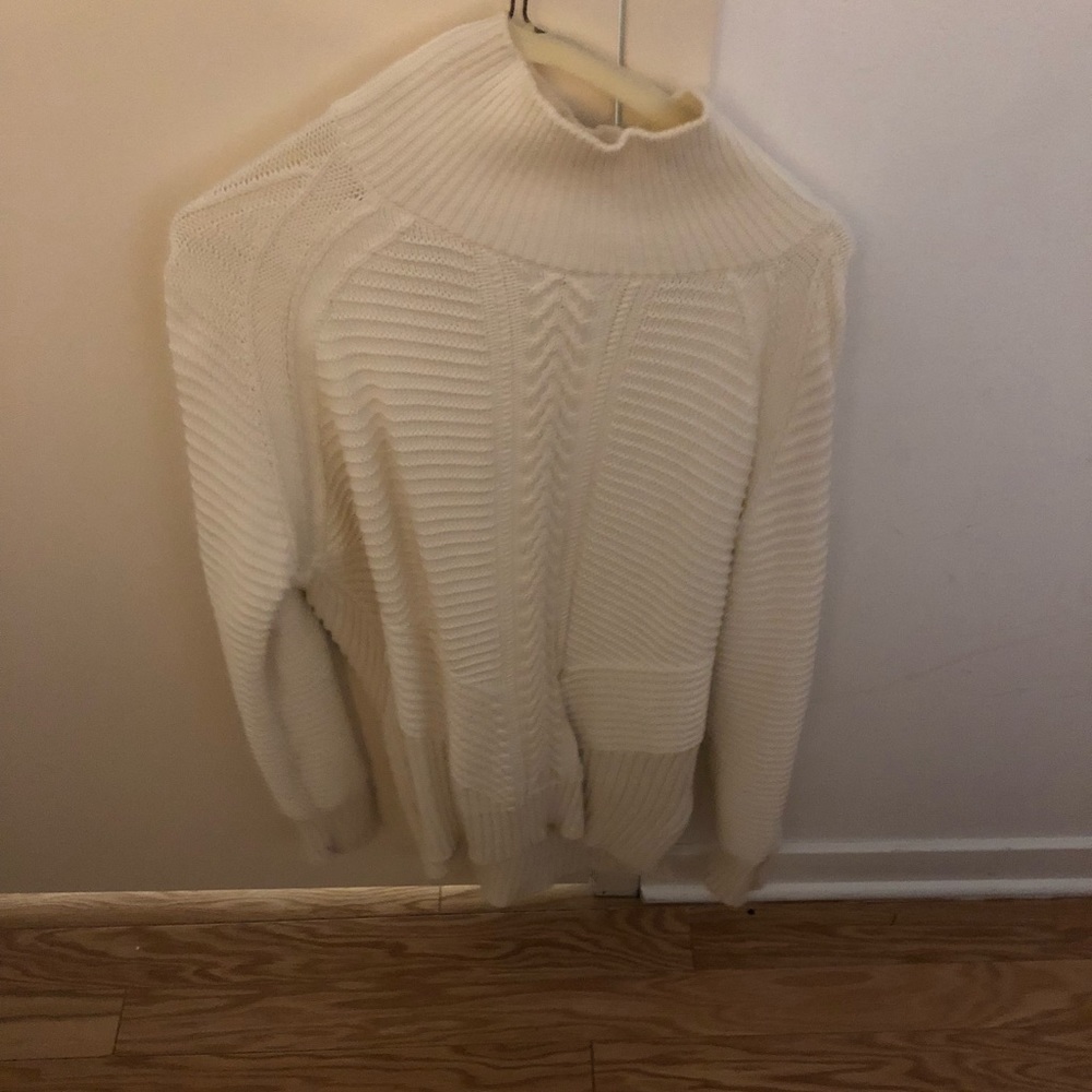 White turtleneck sweater